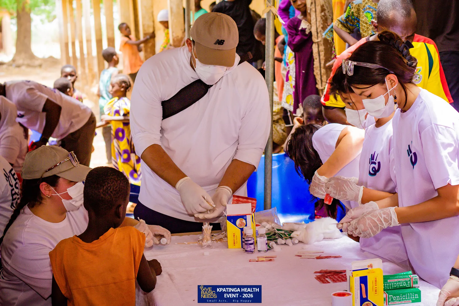 Volunteers helping at the Kpatinga health event